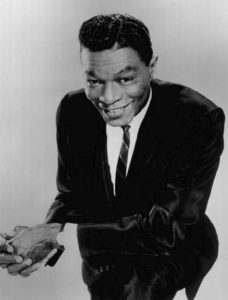 Source: https://commons.wikimedia.org/wiki/File:Nat_King_Cole_2_1964.JPG